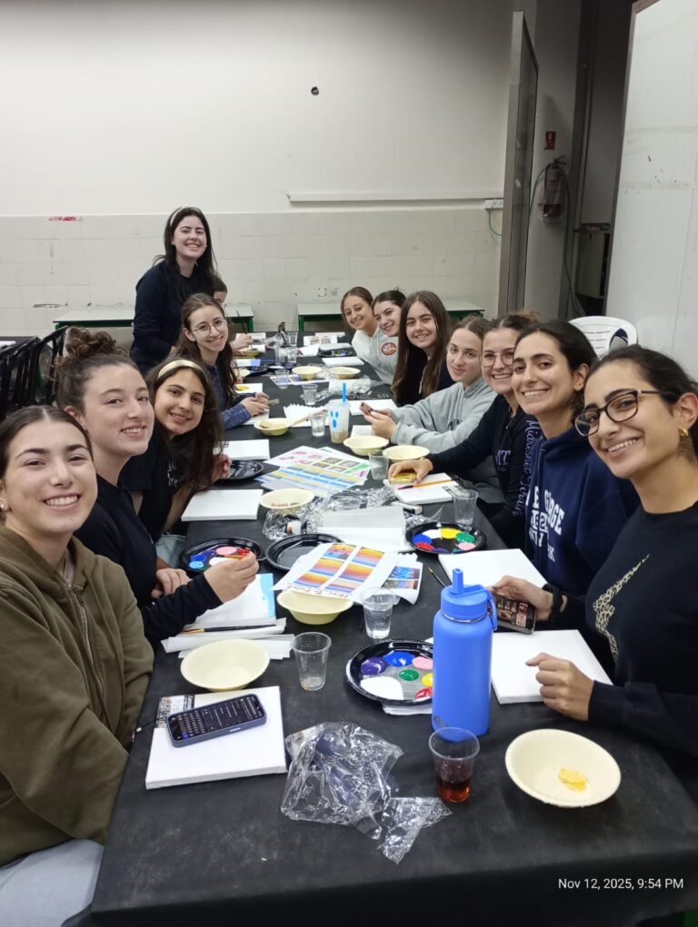 Smiling women painting at art workshop